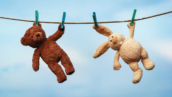 stuffed animal hanging to dry